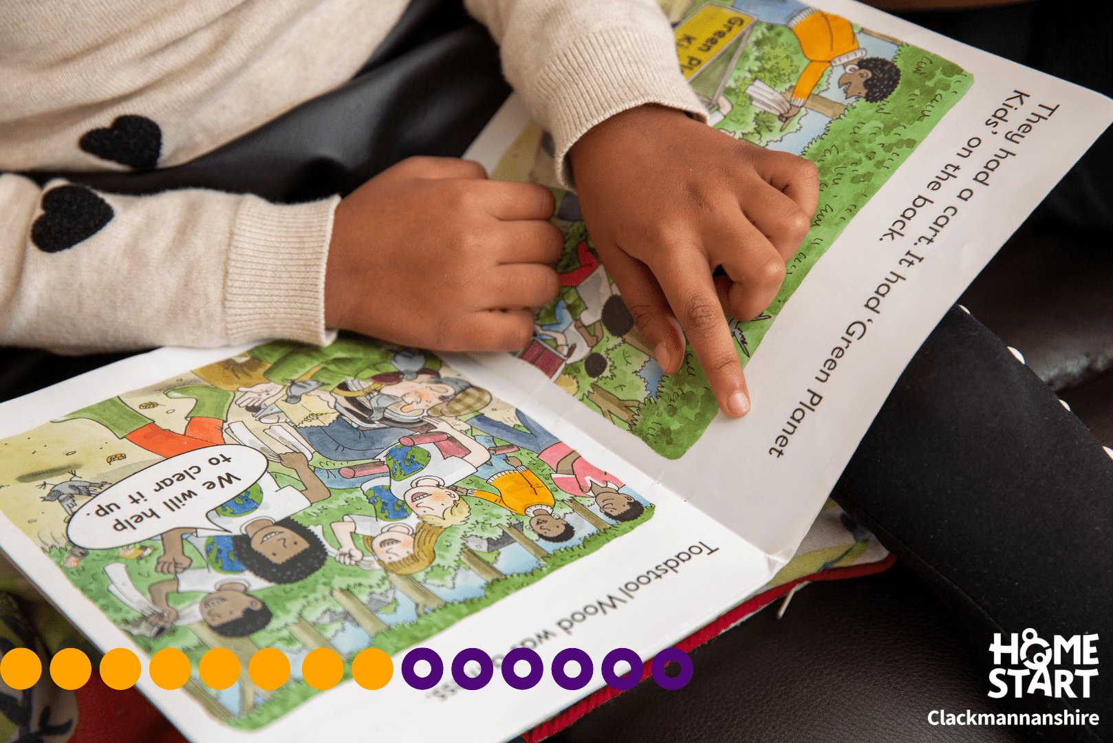 Child reading an illustrated book